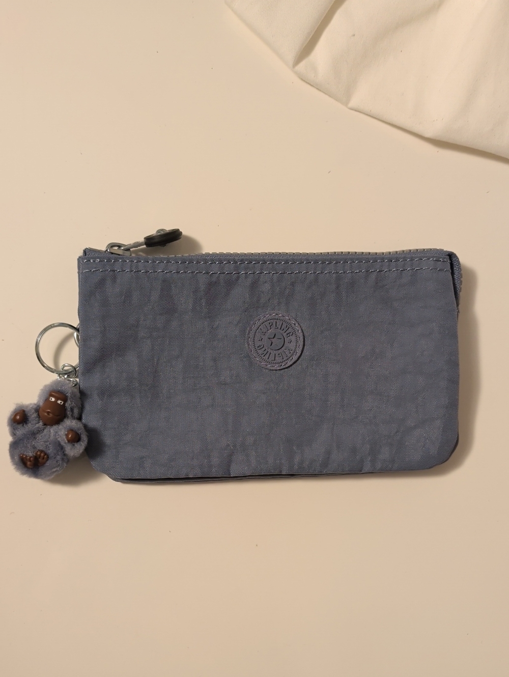 Kipling Slate Blue Zip Cosmetic Pouch with Monkey Charm